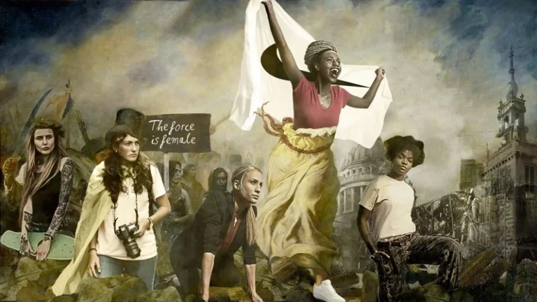 Affiche Nike inspirée de la Révolution française, avec des femmes brandissant un drapeau Nike et le slogan 'The force is female'.